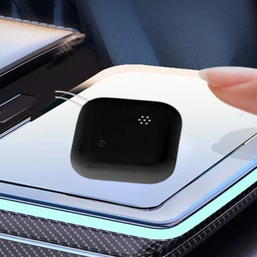 Compact black GPS phone tracker placed on a sleek surface, ideal for discreet tracking of items or phones